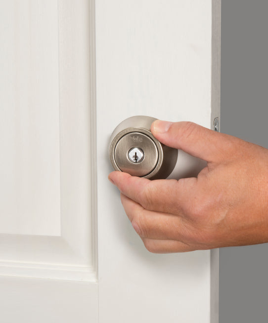 Yale keyed lock installed on a door